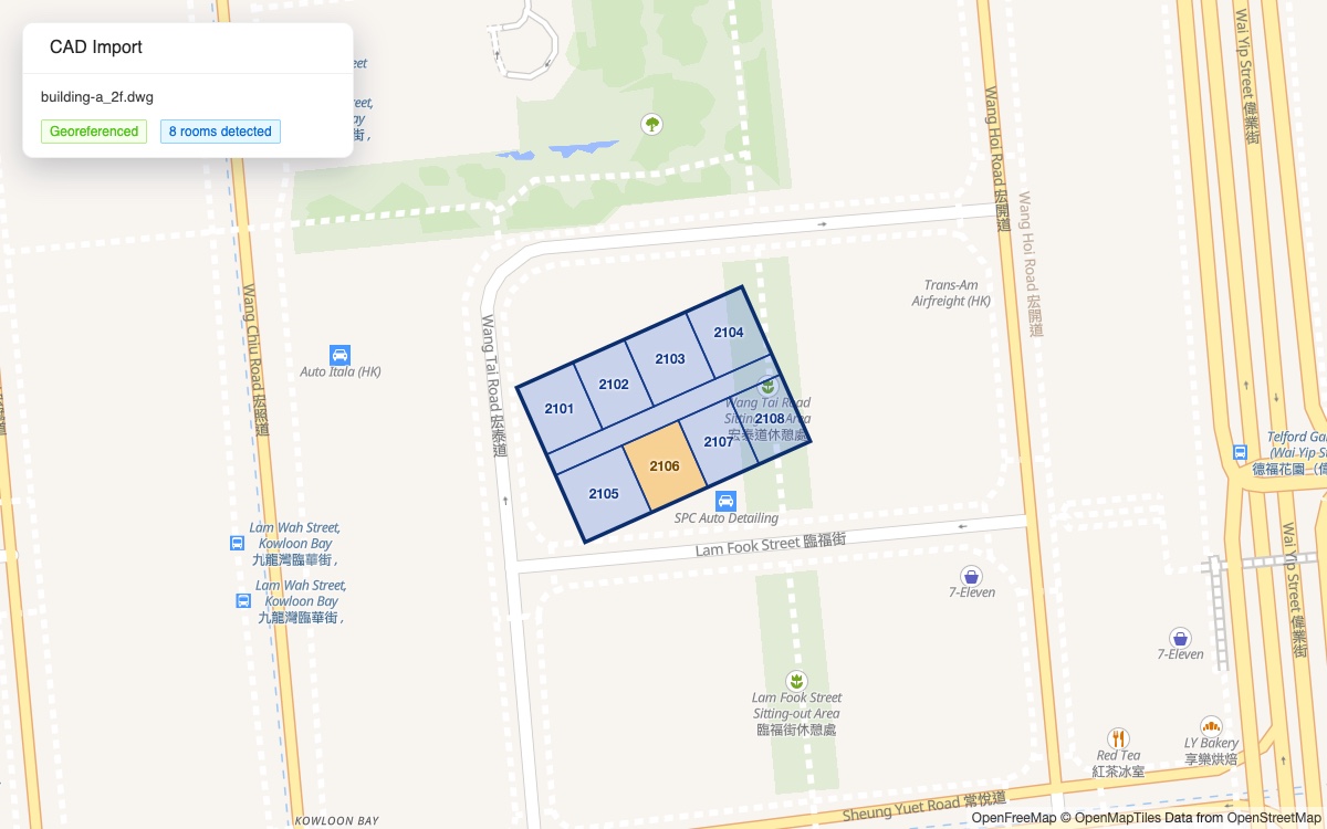 Imported CAD floor plan georeferenced onto an OpenStreetMap base map with rooms outlined